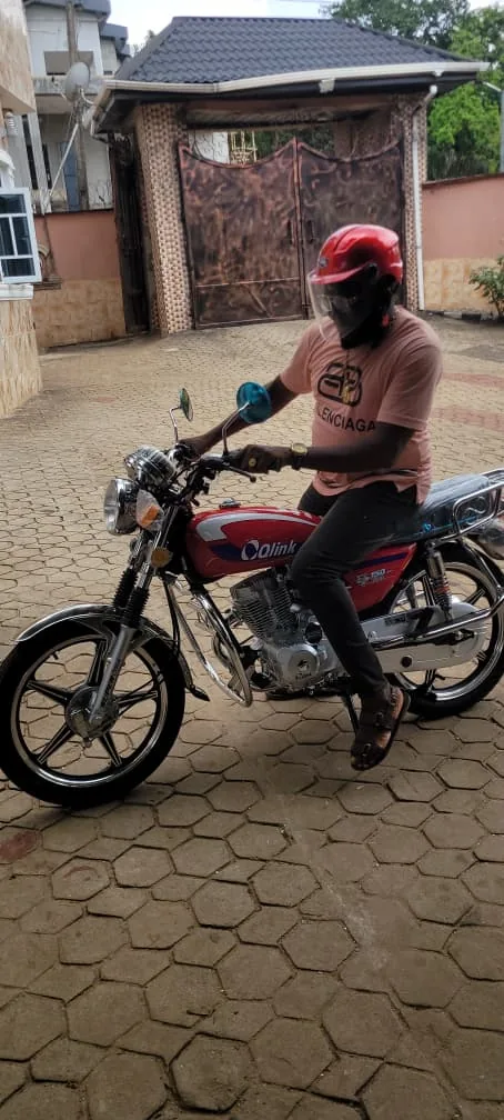 Rider on a motorcycle during Holyghost Anointed Foundation community empowerment activity